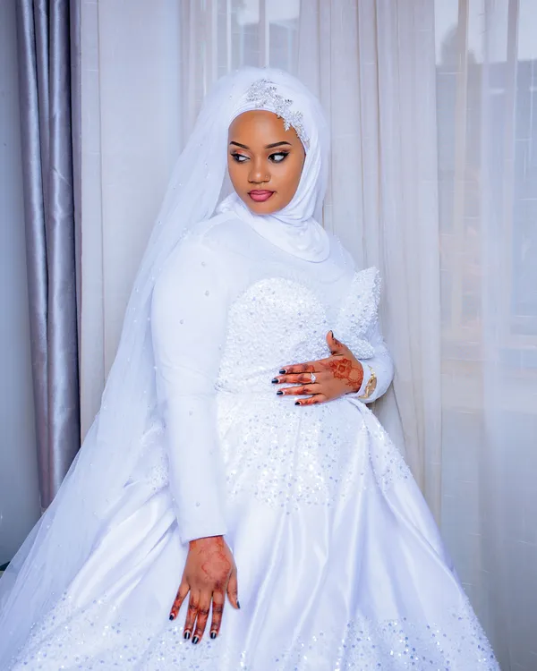 Bride in a white gown and veil